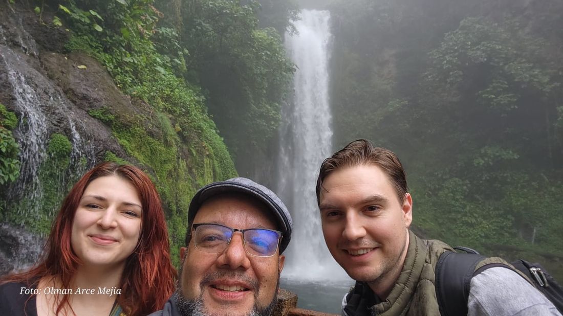 Guests at a waterfall